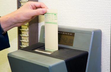 Photo of time clock and punch card