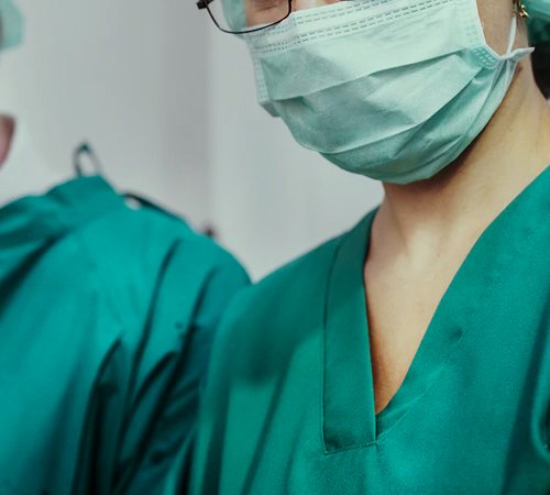 surgeons performing medical procedure