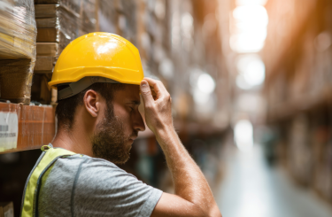 Constructive Discharge: When Intolerable Work Conditions or Prolonged Harassment Make Staying Impossible 1 Warehouse worker in safety gear