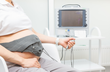Pregnant woman undergoing medical examination