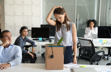 Woman fired from her work and looking upset