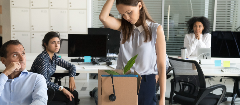 Woman fired from her work and looking upset