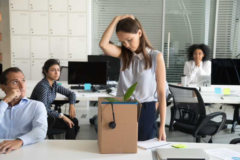 Woman fired from her work and looking upset
