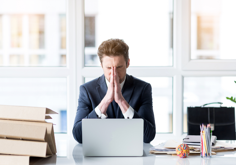 Frustrated Young Employee Is Working Wearily