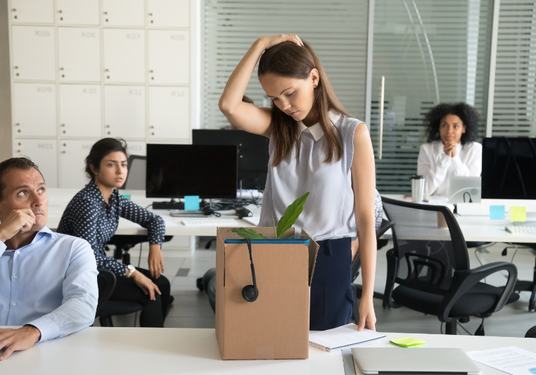 Woman fired from her work and looking upset